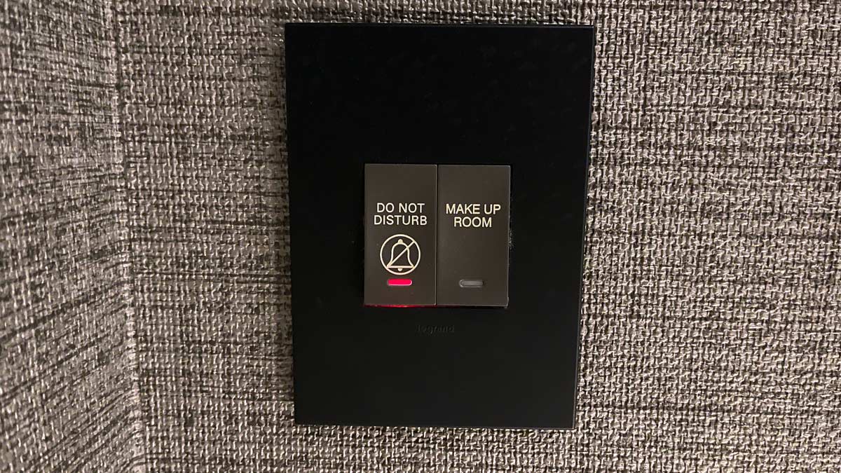 a black rectangular object with a sign on it