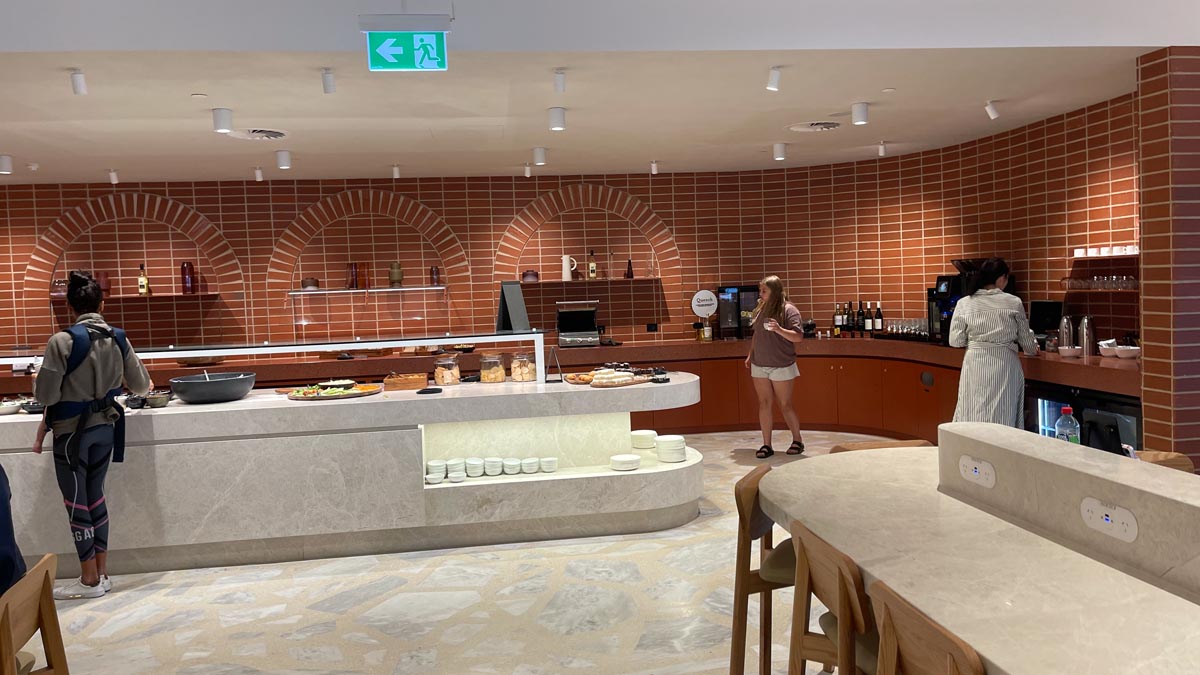 a woman standing in a restaurant