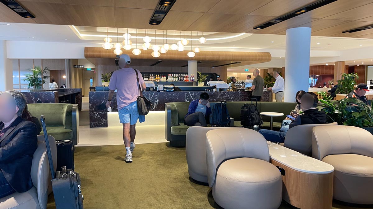 a man walking in a lobby