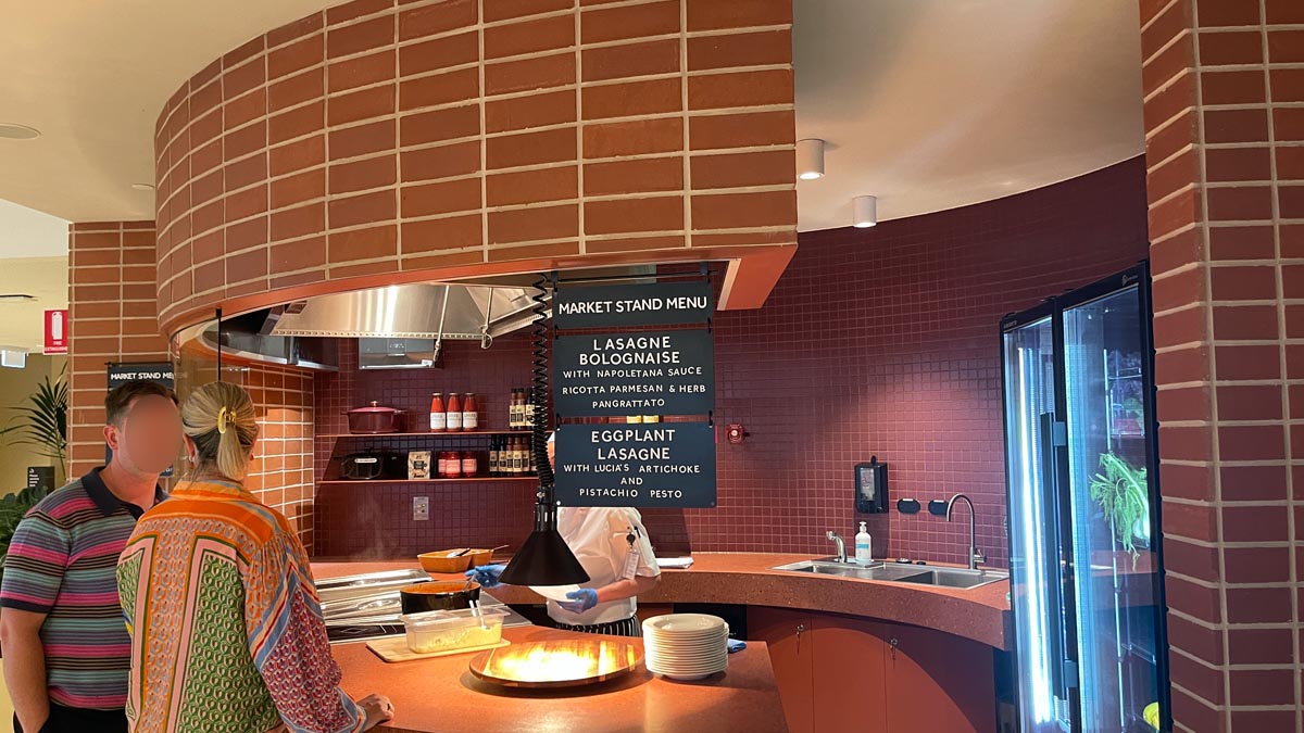 a woman cooking in a kitchen