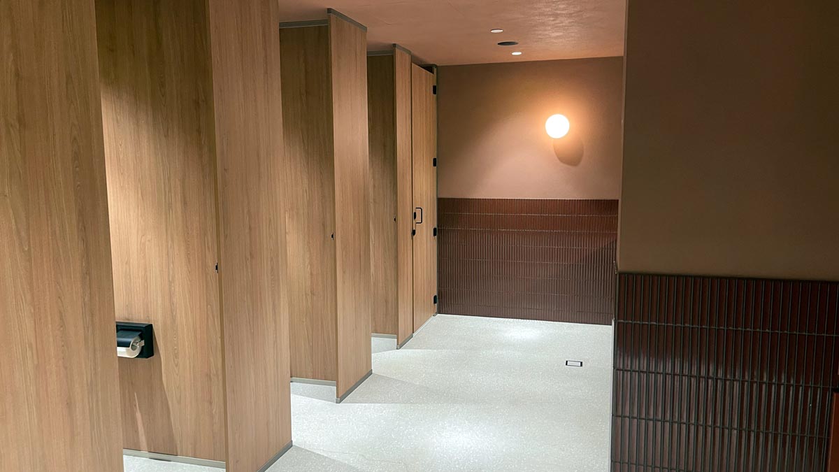 a row of doors in a hallway