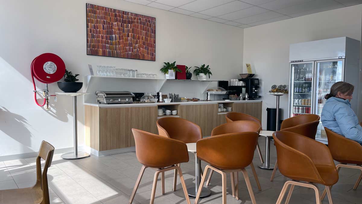 a room with a table and chairs