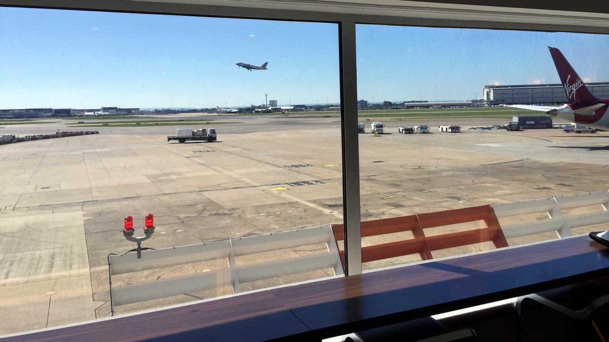 a plane flying over an airport