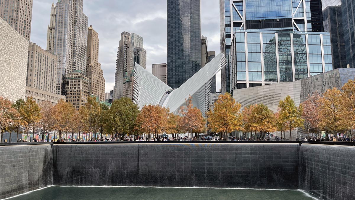 a group of people in front of a city