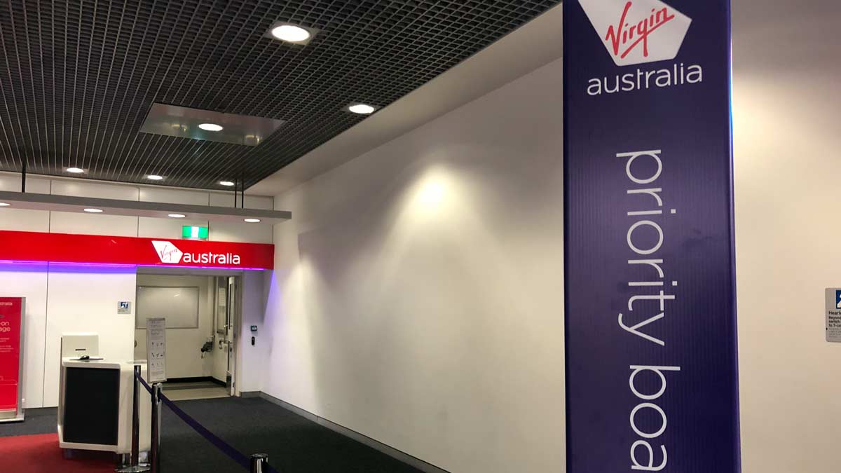 a white wall with a sign on it