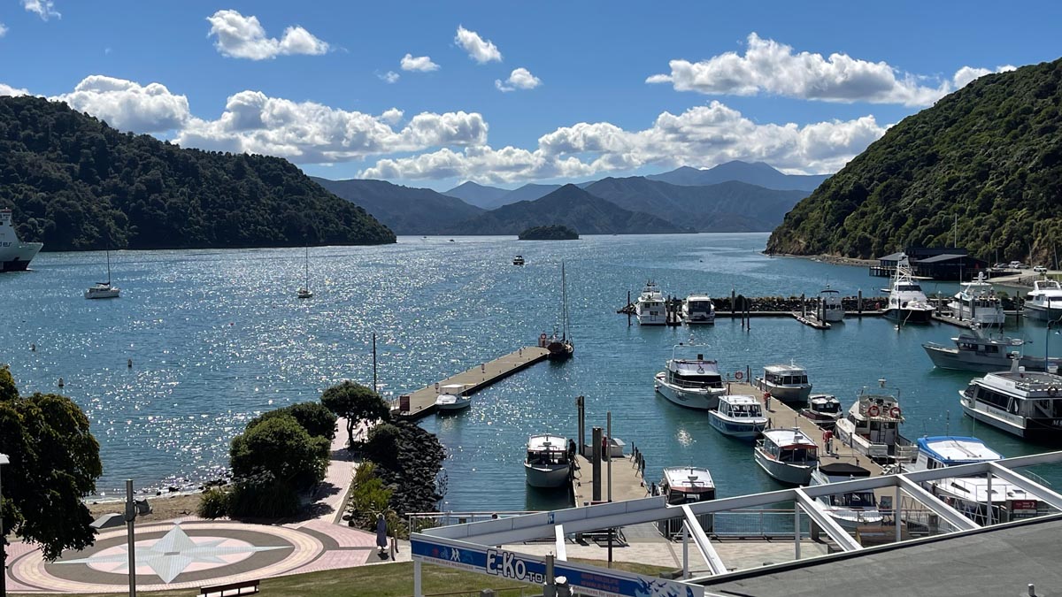 a dock with boats in the water