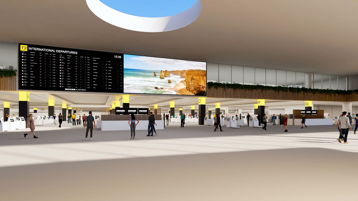 a large room with people walking around